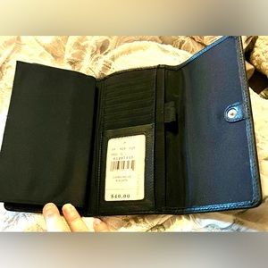 Black Wilsons Leather Wallet in very good condition and the leather feel…